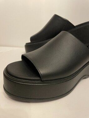 Sorel "Dayspring" black platform slide sandals, size 9.5